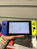 Nintendo Switch Console, 32GB + Blue/Yellow Joy-Con