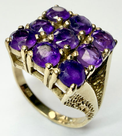 9ct yellow gold cluster ring with purple stones size N