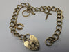 9CT GOLD CHARM BRACELET 14.84G PRESTON STORE