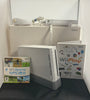 wii console with games boxed