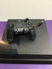 PS4 with controller.