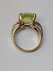 9ct gold ring with large lime green stone size M