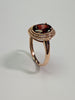 9ct gold rope mount style ring with large red stone