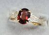9ct Gold Ring with Red/clear Stones Size "O"
