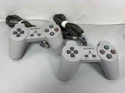 Ps1 PlayStation one classic with two controllers.