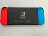 nintendo switch console red and blue joycons