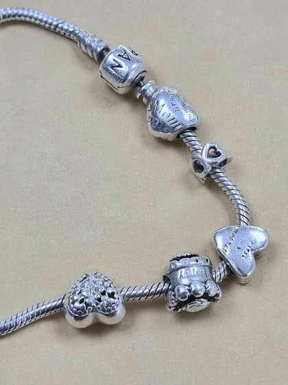 PANDORA BRACELET + 5 CHARMS