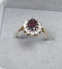 9CT GOLD GARNET RING WITH CZ STONES SIZE P