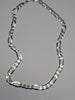 Brand new silver Figaro chain