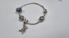 Silver Bracelet with 4 charms