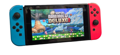 Nintendo Switch Console + Mario Bros Deluxe