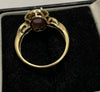9CT gold ring with purple stone (N)