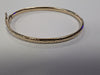 9CT GOLD PATTERNED BANGLE