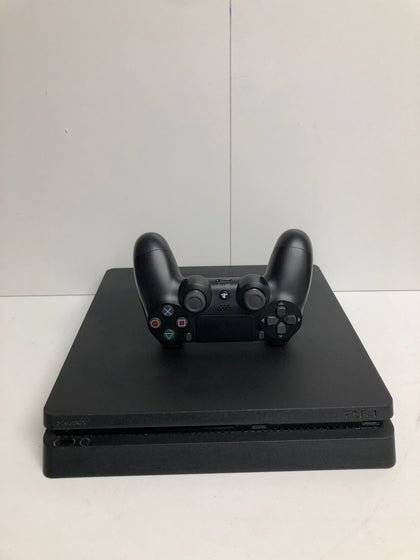 Sony PlayStation 4 Console Slim with controller and games