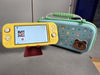 Nintendo Switch Lite Console, 32GB Yellow (Comeas With Mario Kart & Carry Case)