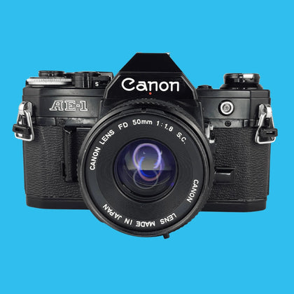 Canon AE-1 Black 35mm SLR Film Camera with Canon Prime Lens.