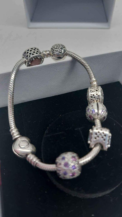 PONDORA bracelet with 6 charms , in box.