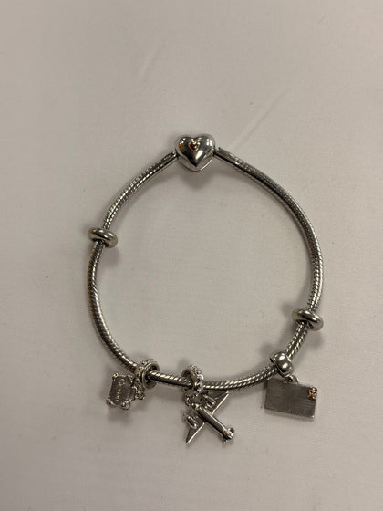 clogau bracelet and charms