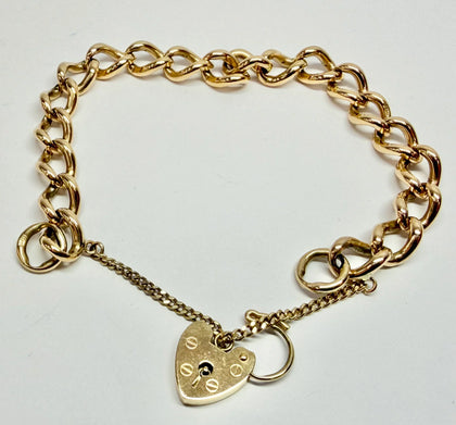 9ct yellow gold curb link bracelet with heart clasp with safety chain 7