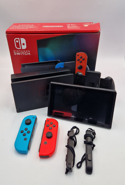 Nintendo Switch 32GB red/blue handheld gaming console with original charger joy-con grips and cradle BOXED