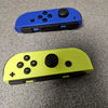 Nintendo Switch Joycons Blue (left) & Neon Yellow (Right)