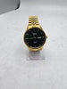 lorus gold tone/green automatic watch