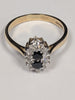 9ct gold ring with black stones
