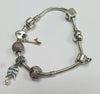 PANDORA BRACELET WITH 7 CHARMS