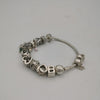 Pandora Bracelet 44.3Grams, 12 Charms (Love Hearts, Flower, Family)925 ALE Hallmarked, 7.5" Length, Box Included