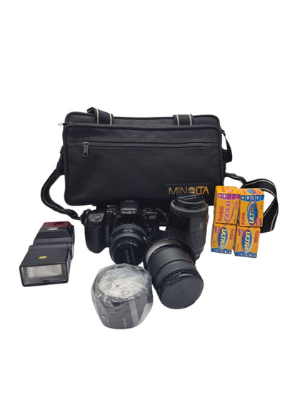 Minolta Dynax 500si Film Camera with 3 lenses and 4 extra films and a Cobra 440AF Flash