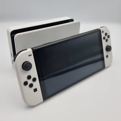 Nintendo Switch OLED 64GB white/black handheld console with hdmi dock. Original charger and joy-con cradle. Comes with carry case