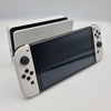 Nintendo Switch OLED 64GB white/black handheld console with hdmi dock. Original charger and joy-con cradle. Comes with carry case