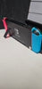 Nintendo Switch Console, 32GB + Neon Red/Blue Joy-Con