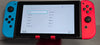 Nintendo Switch Console, 32GB + Neon Red/Blue Joy-Con, V2 ***Unboxed, With Aladdin & Lion King game***