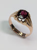 9ct gold ring with large red centre stone