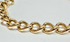 9ct yellow gold curb link bracelet with heart clasp 7"