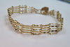 9ct gold gate bracelet 7"