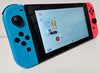 *New Years Sale!* Nintendo Switch Console - Neon Red/Blue & 2 Games ( 1Unboxed)