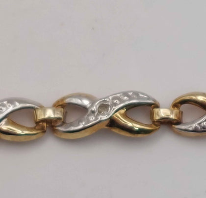 9ct 375 Yellow Gold crossover style bracelet 2.1g 8