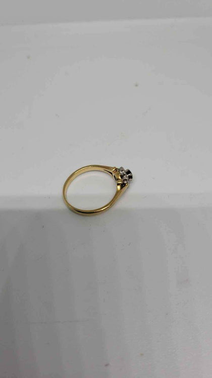 18ct Yellow Gold Ring With Black Stone Surronded By Clear Stones (Not Dia) - Size O - 3.43 Grams