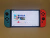 Switch Console, 64gb OLED + Neon Red/Blue Joy-Con, Boxed with 3 games