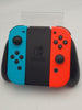 Nintendo Switch 32GB console with red/blue joycons, Dock, charger and cradle UNBOXED