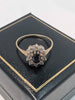 9ct Yellow Gold Ladies Ring With Black Stone Surrounded By Clear Stones - Size P - 1.61 Grams