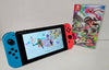 *Boxing Day Sale* Nintendo Switch Console - Neon Red/Blue & 2 Games ( 1Unboxed)