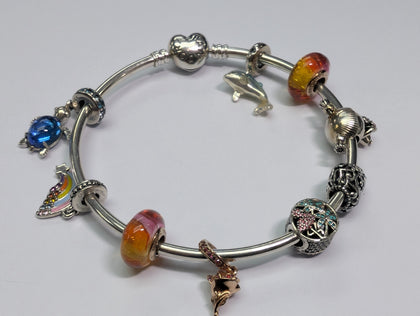 silver pandora bangle with 9 charms
