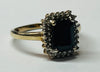 9CT YELLOW GOLD RING WITH BLACK STONE SIZE M 1/2