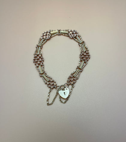 9ct Gold two tone gate bracelet with heart lock and safety chain