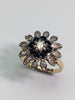 18CT Gold Diamond Flower Ring With Black Stones