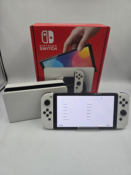 Nintendo Switch OLED boxed with charging dock