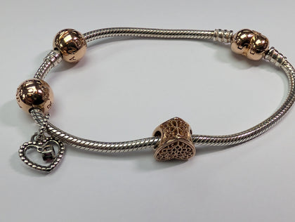 Pandora Charm bracelet With Rose Gold Charms